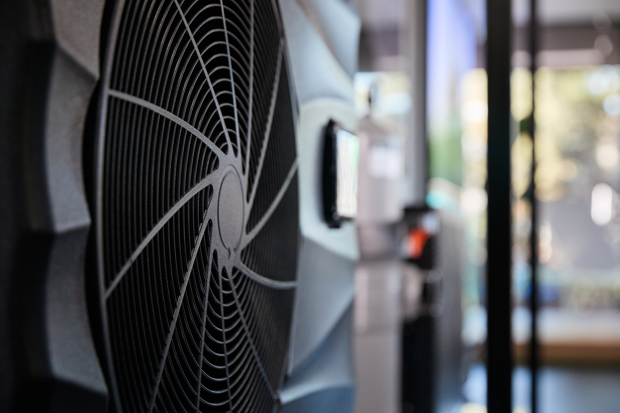 Close-up of a pool heat pump fan