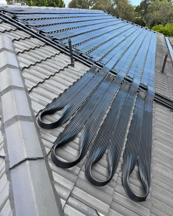 Solar pool heating installation on a Melbourne roof